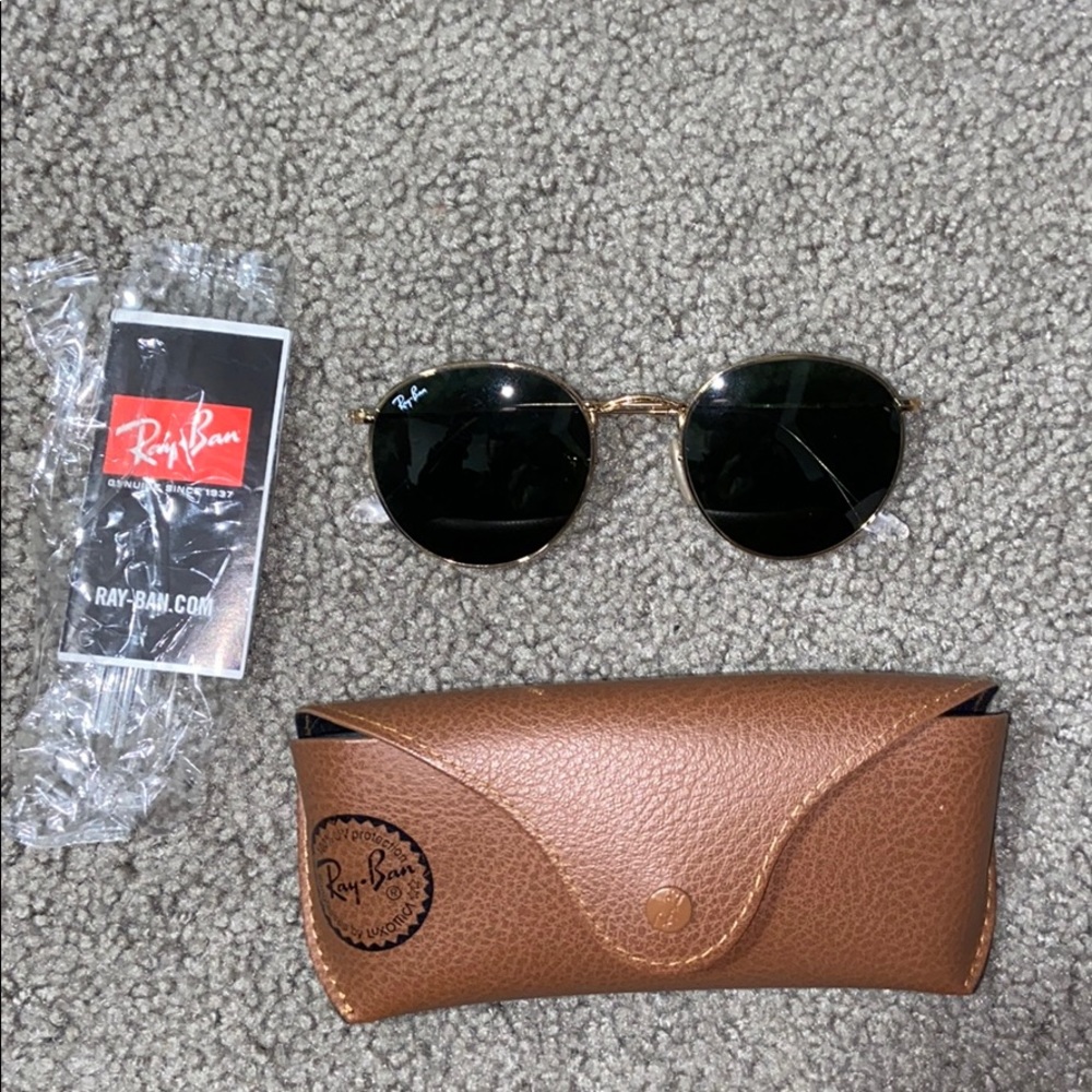 NEW RAYBANS WITH CASE AND PAMPHLET